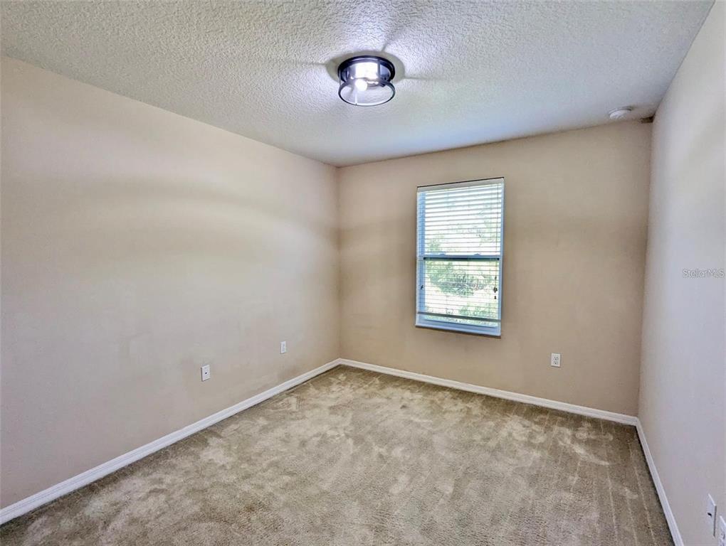 5552 Rutherford Place Oviedo, FL 32765 - Photo 15 of 20 an empty room with a window