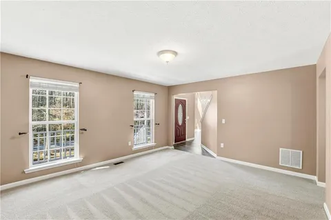 an empty room with windows