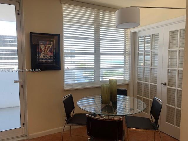 100 Lincoln Road, Unit 1129 Miami Beach, FL 33139 - Photo 2 of 31 a view of a dining room with furniture and window