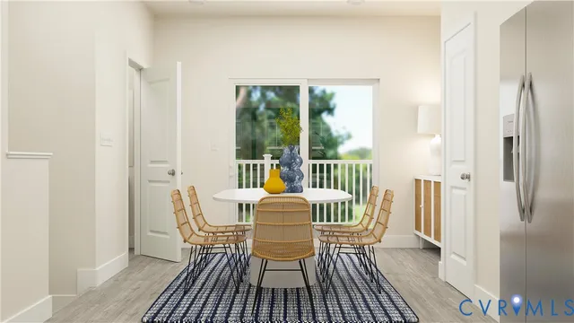 a dining room with furniture window and outside view
