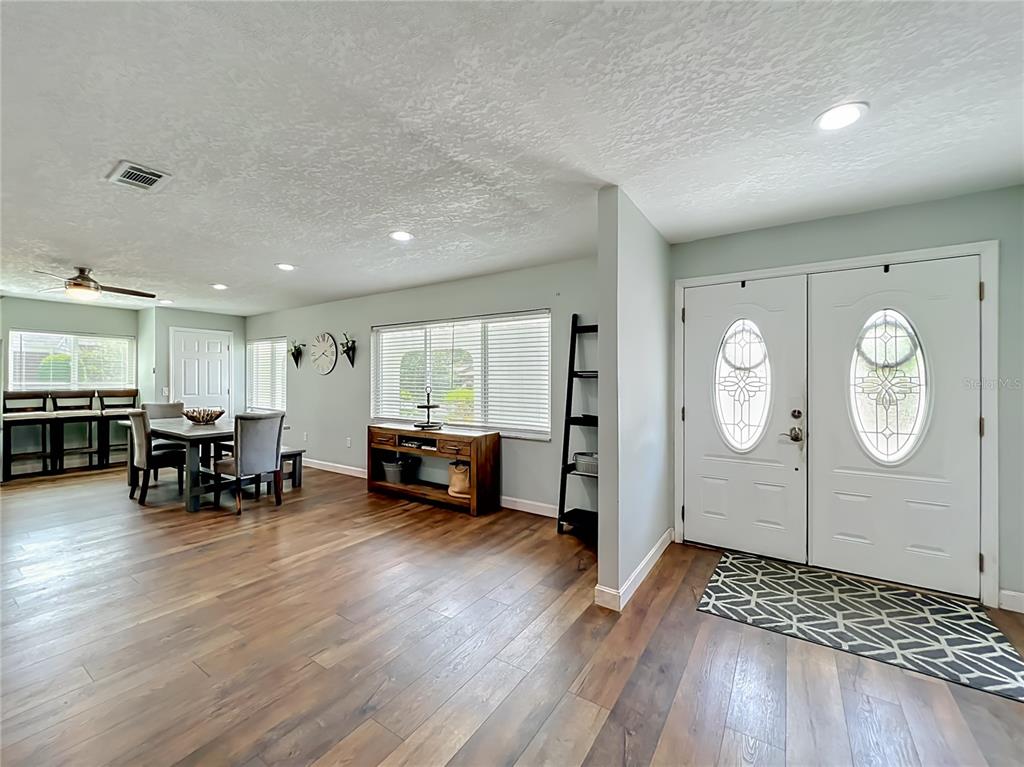 153 Variety Tree Circle Altamonte Springs, FL 32714 - Photo 6 of 44 a view of livingroom with furniture and wooden floor