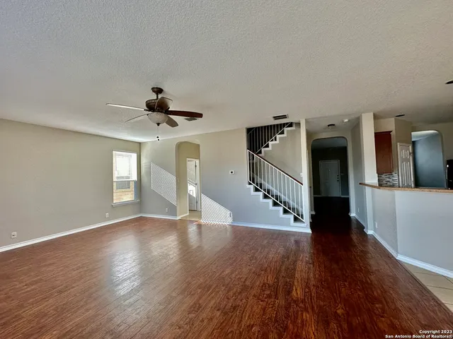 a view of an entryway with wooden floor