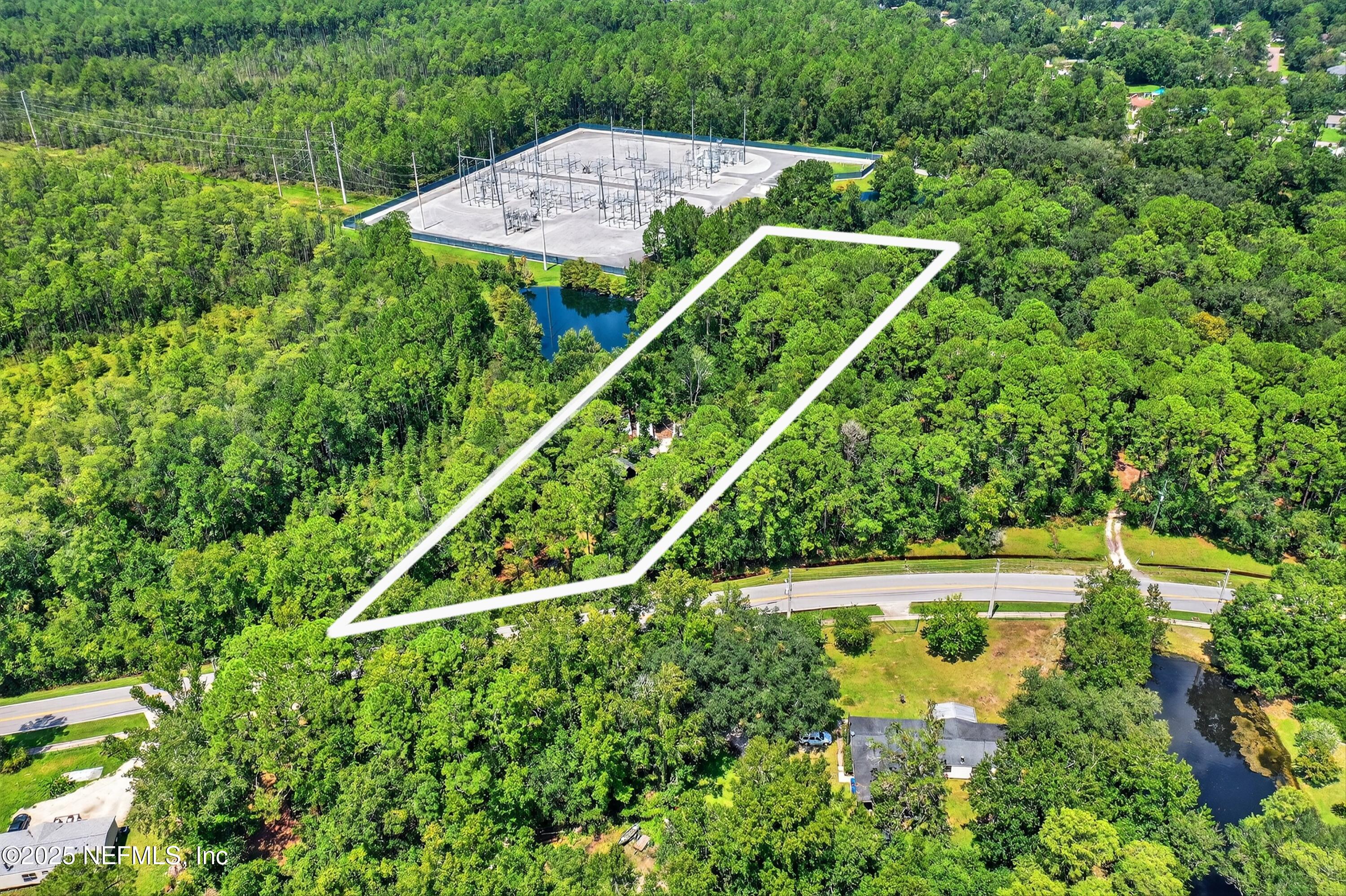 2561 Starratt Road Jacksonville, FL 32218 - Photo 15 of 20 an aerial view of a house
