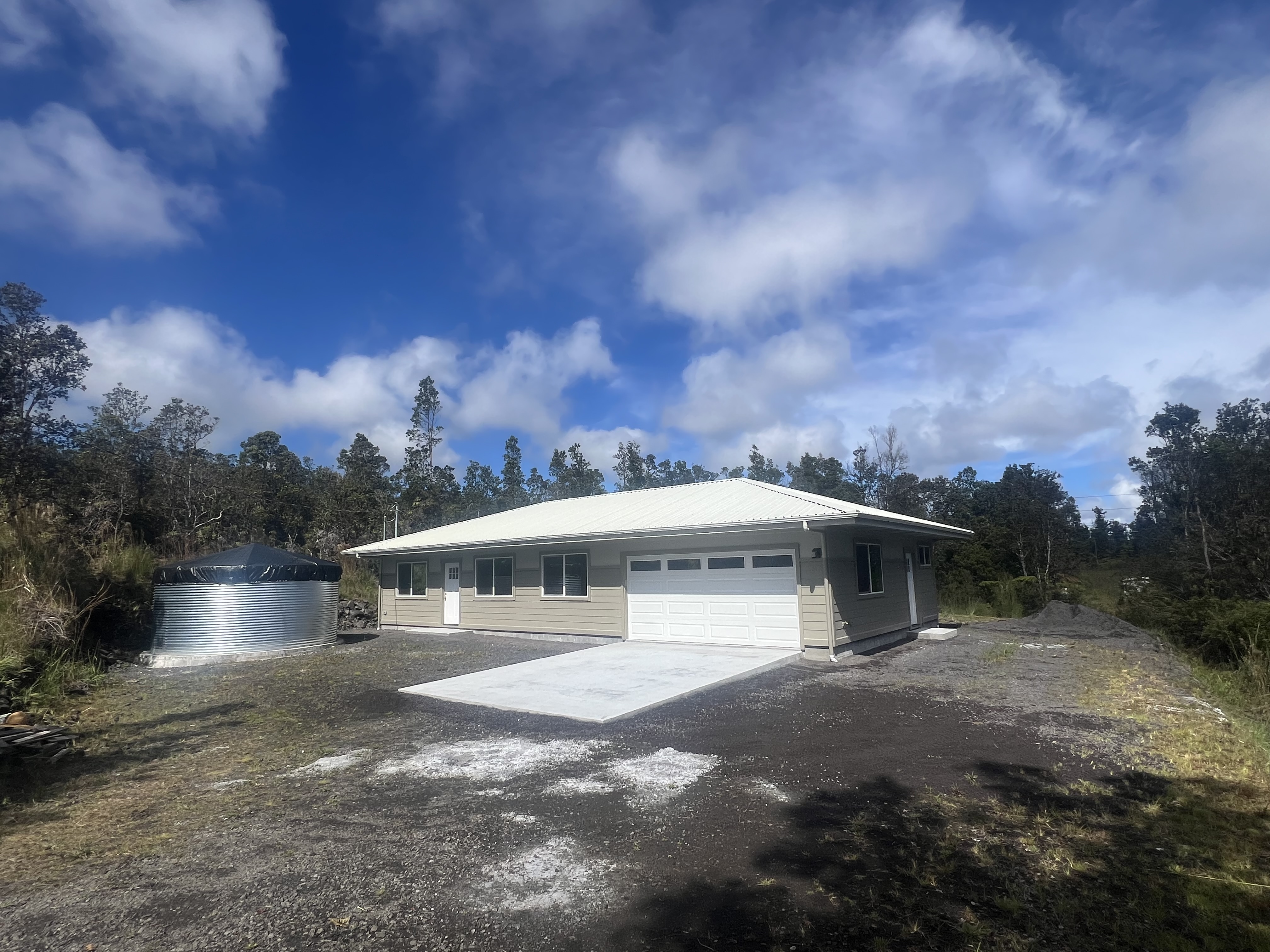a view of house with outdoor space and sitting space