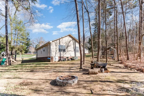 a view of a house with snow on the ground