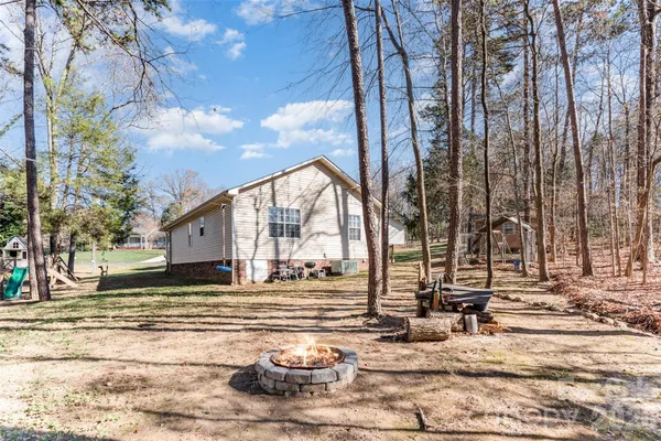a view of a house with snow on the ground