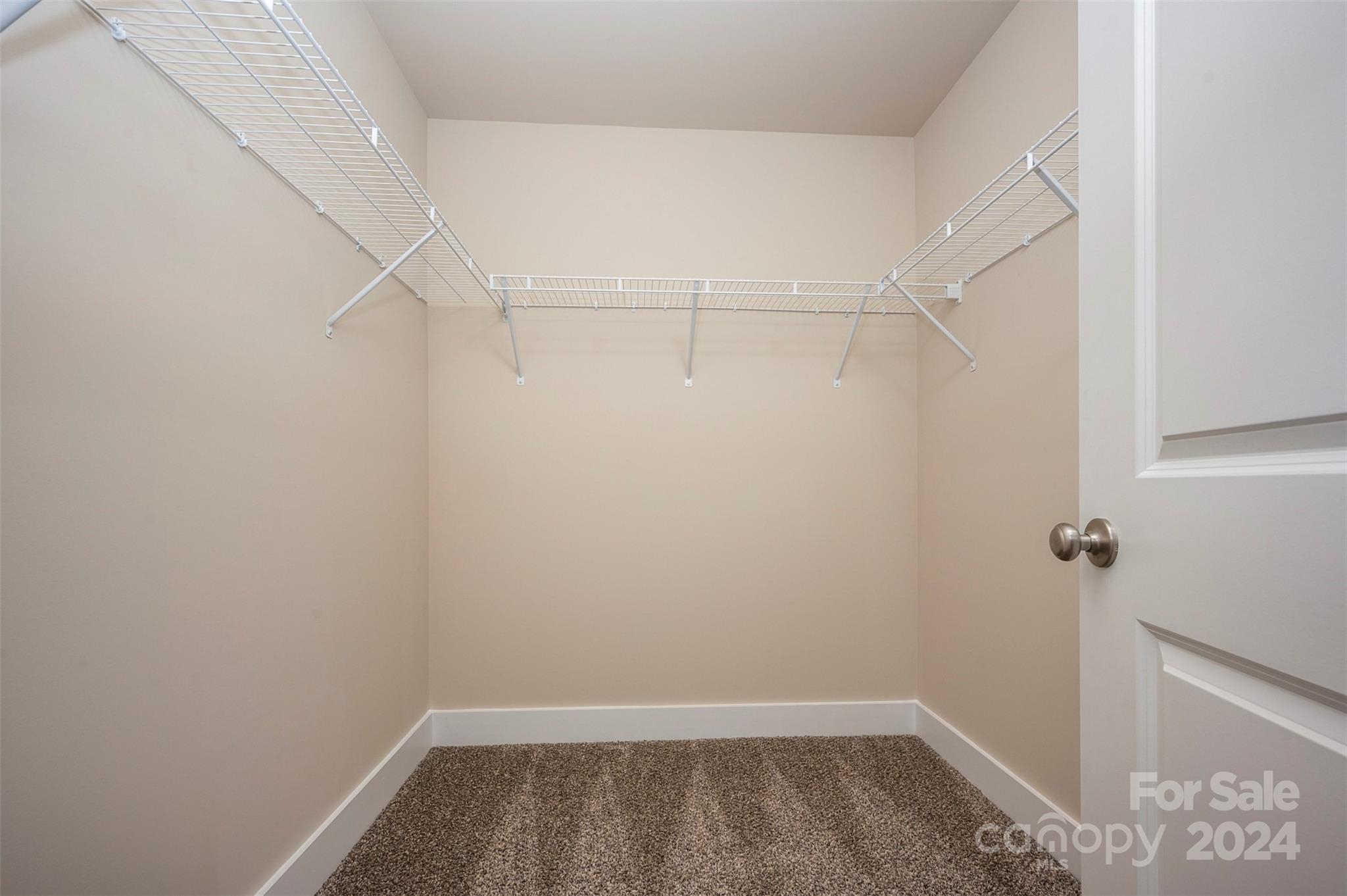 139 Forest Lake Road Forest City, NC 28043 - Photo 20 of 33 a view of a room with racks on the wall