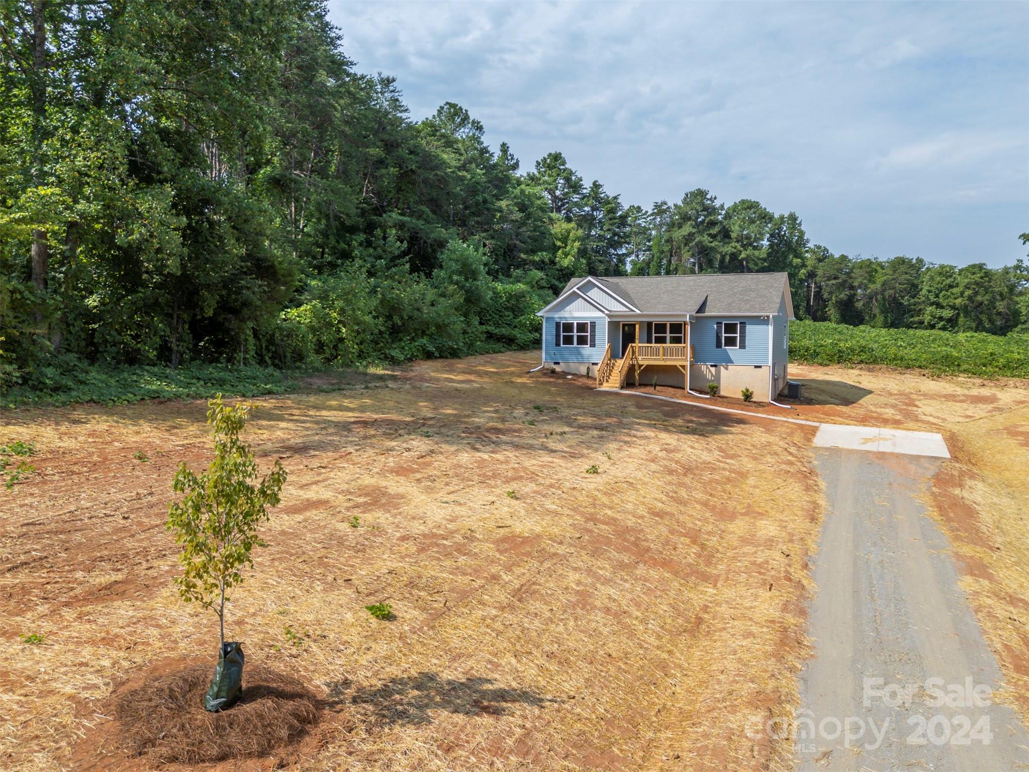 139 Forest Lake Road Forest City, NC 28043 - Photo 2 of 33 a view of a house with a yard