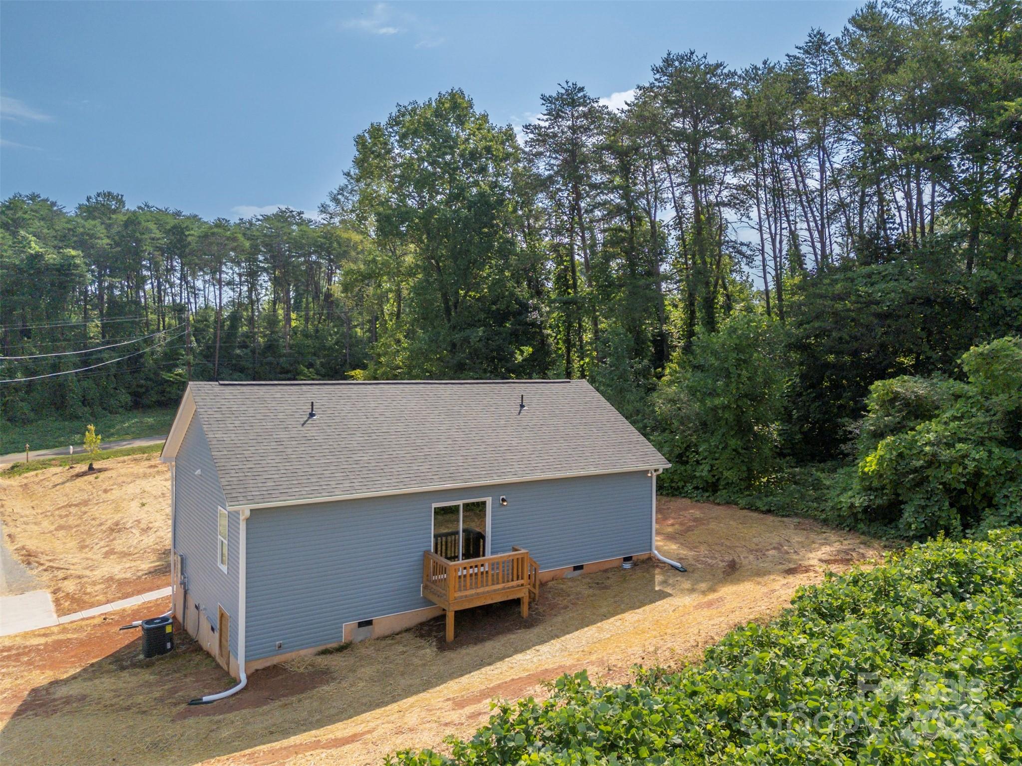 139 Forest Lake Road Forest City, NC 28043 - Photo 29 of 33 a view of a patio on the side of a road