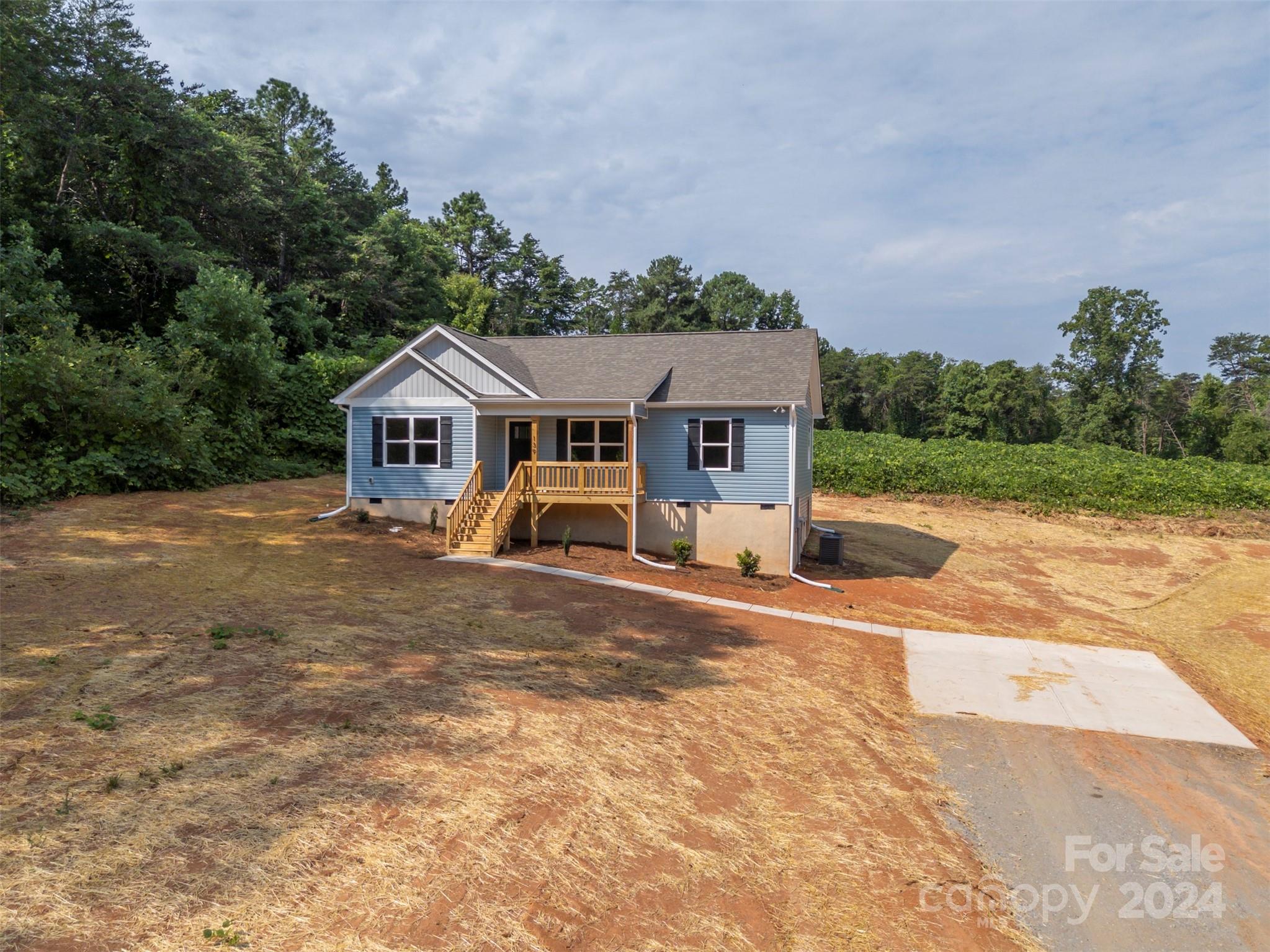139 Forest Lake Road Forest City, NC 28043 - Photo 3 of 33 an aerial view of a house with swimming pool and furniture