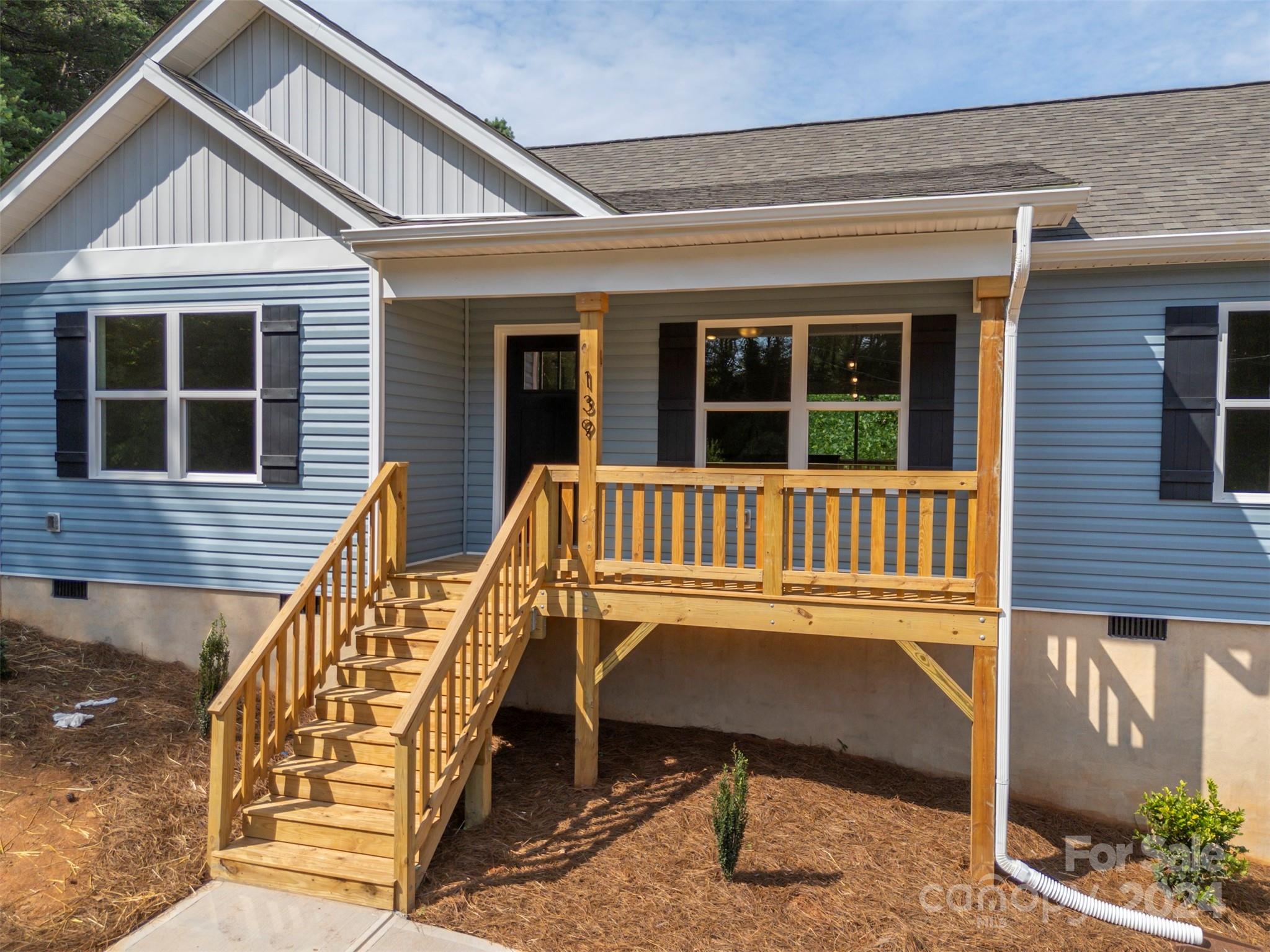 139 Forest Lake Road Forest City, NC 28043 - Photo 6 of 33 a view of a house with a deck and furniture