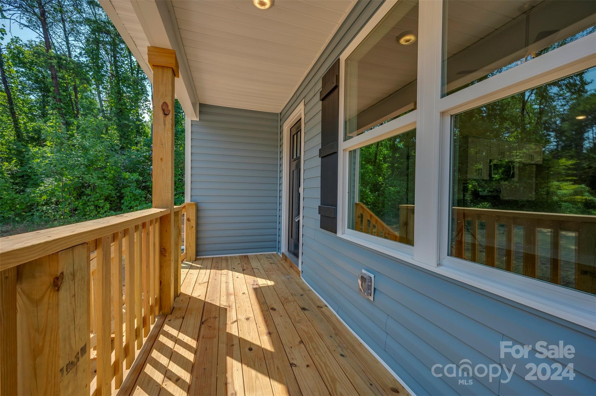 139 Forest Lake Road Forest City, NC 28043 - Photo 7 of 33 a view of balcony with wooden floor and fence