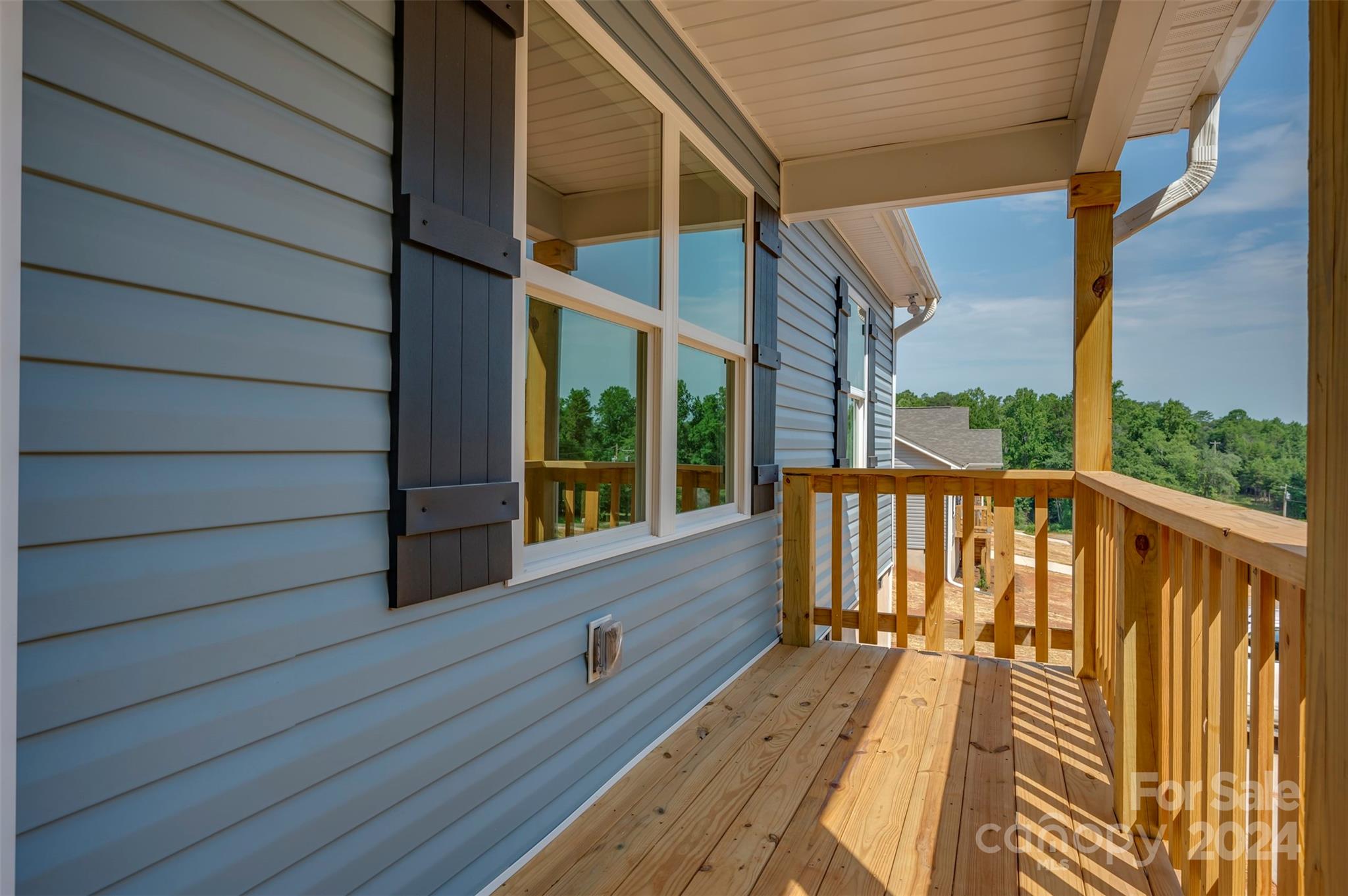 139 Forest Lake Road Forest City, NC 28043 - Photo 8 of 33 a view of balcony with wooden floor