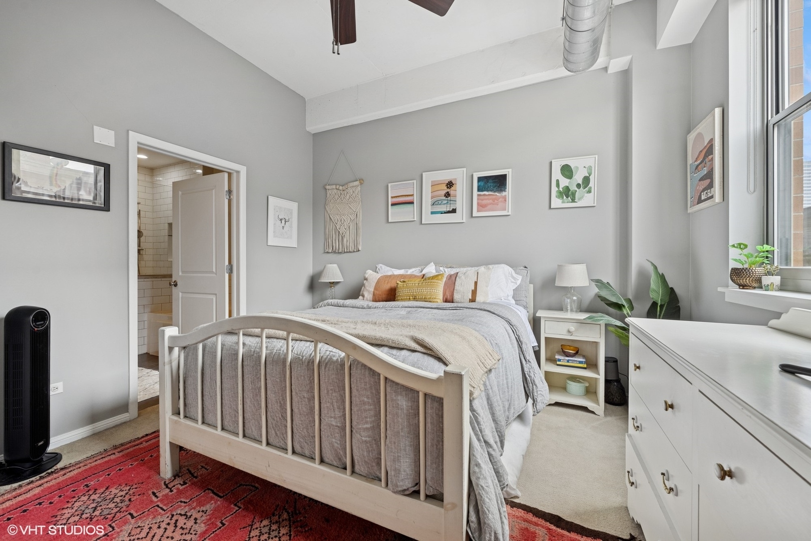 950 West Monroe Street, Unit 410 Chicago, IL 60607 - Photo 18 of 23 a bedroom with a bed and a table