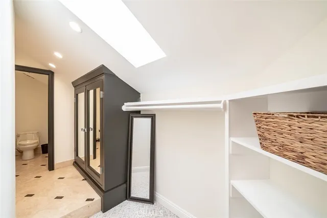 a view of a kitchen and dining room