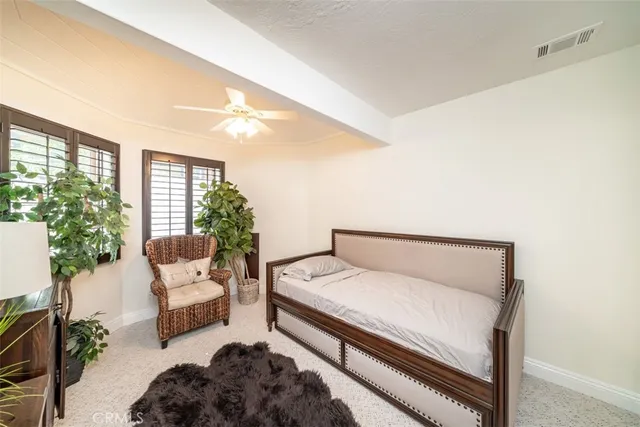 a view of a chairs and table in backyard