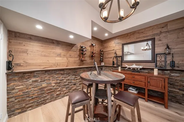 an aerial view of residential house with outdoor space and covered with swimming pool