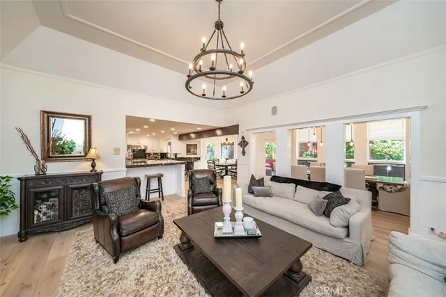 a kitchen with stainless steel appliances kitchen island granite countertop a stove and a sink