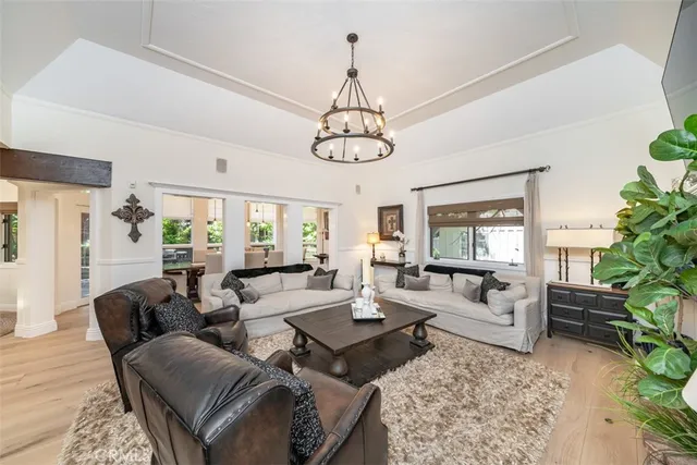 a kitchen with lots of counter top space and living room