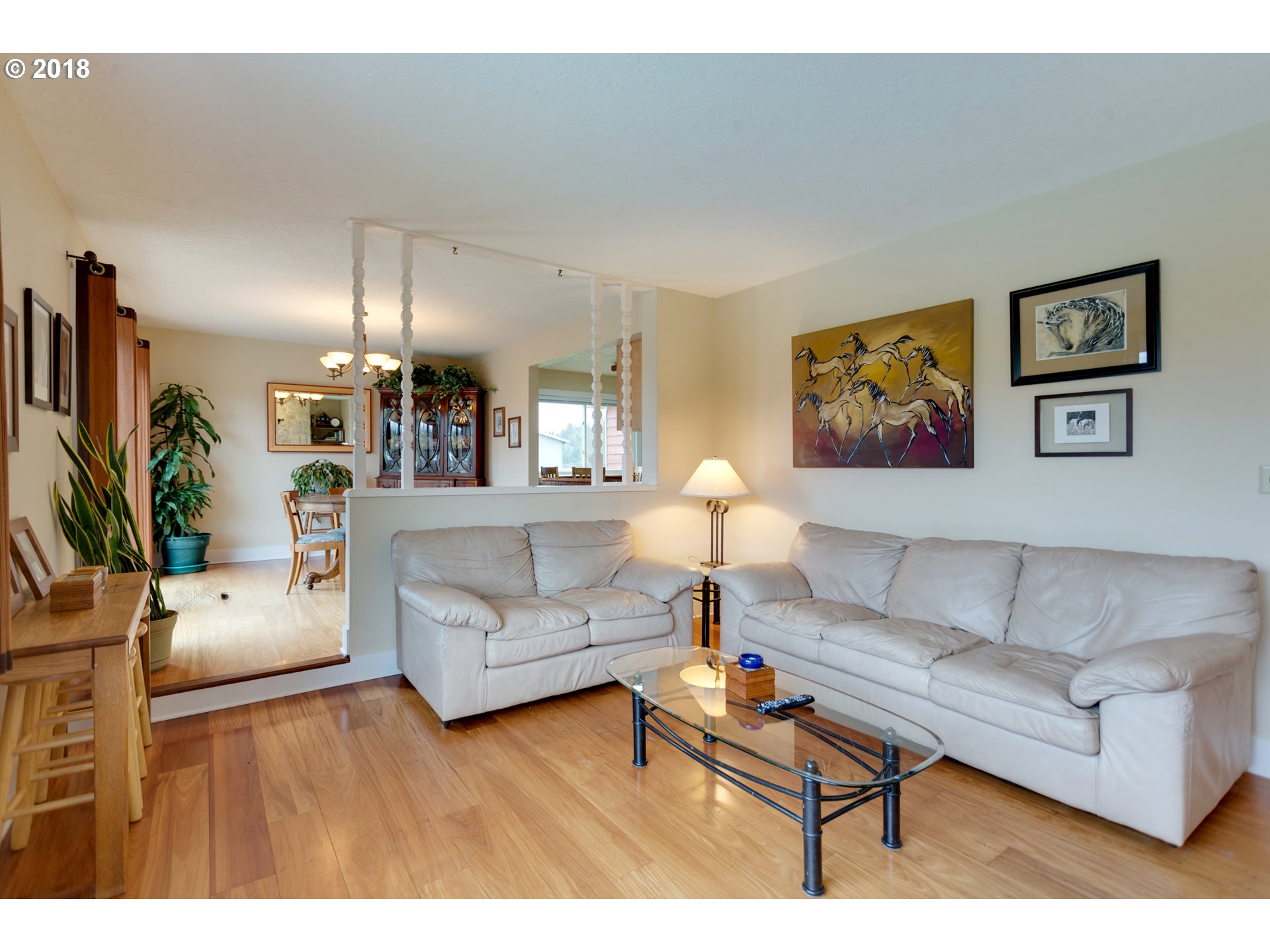 17067 South McCubbin Road Oregon City, OR 97045 - Photo 6 of 32 a living room with furniture and a flat screen tv