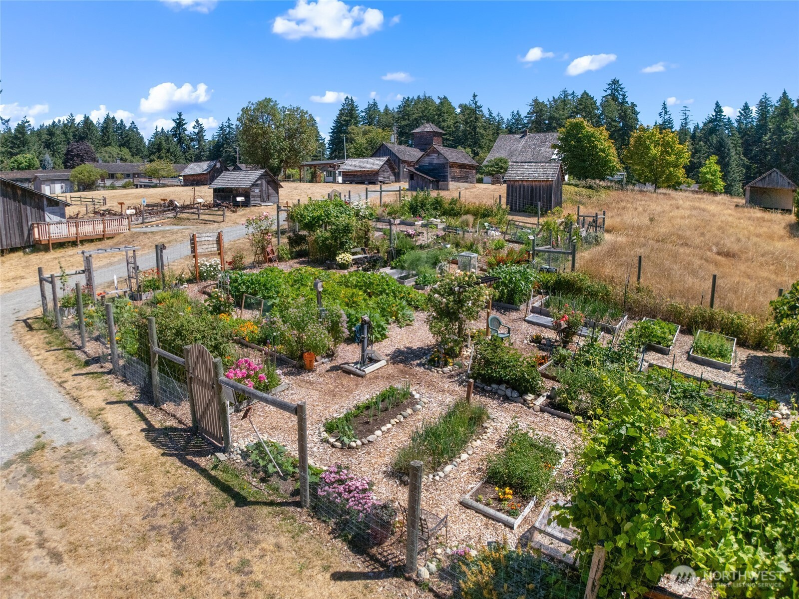 9606 Otso Point Road Anderson Island, WA 98303 - Photo 14 of 25 a view of a garden with sitting area