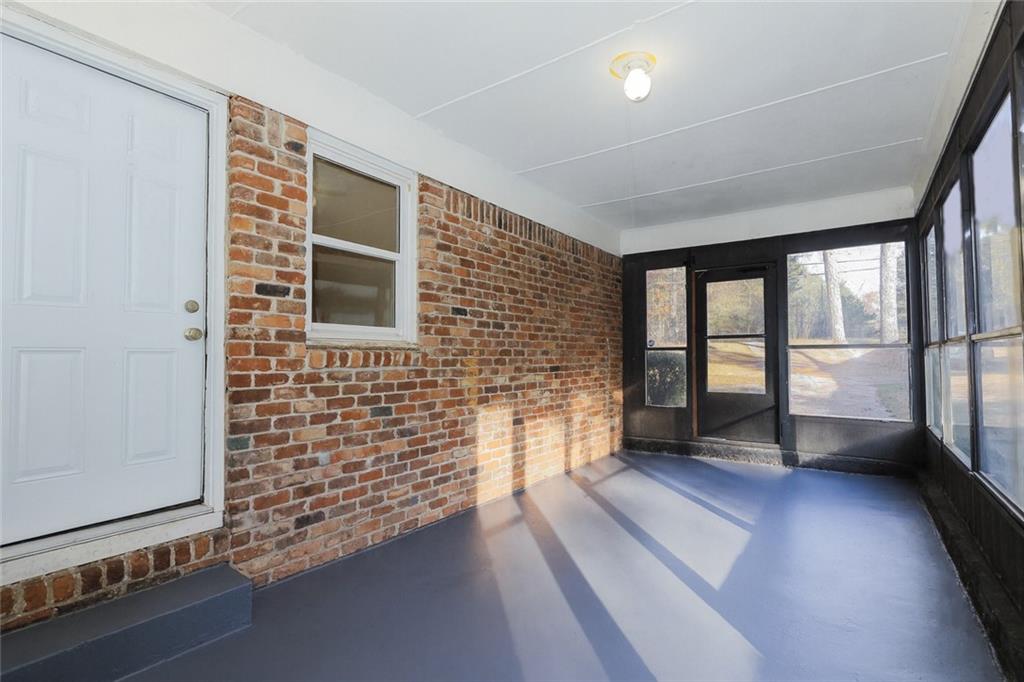 4572 Campbellton Road Southwest Atlanta, GA 30331 - Photo 3 of 21 a view of an empty room with a window