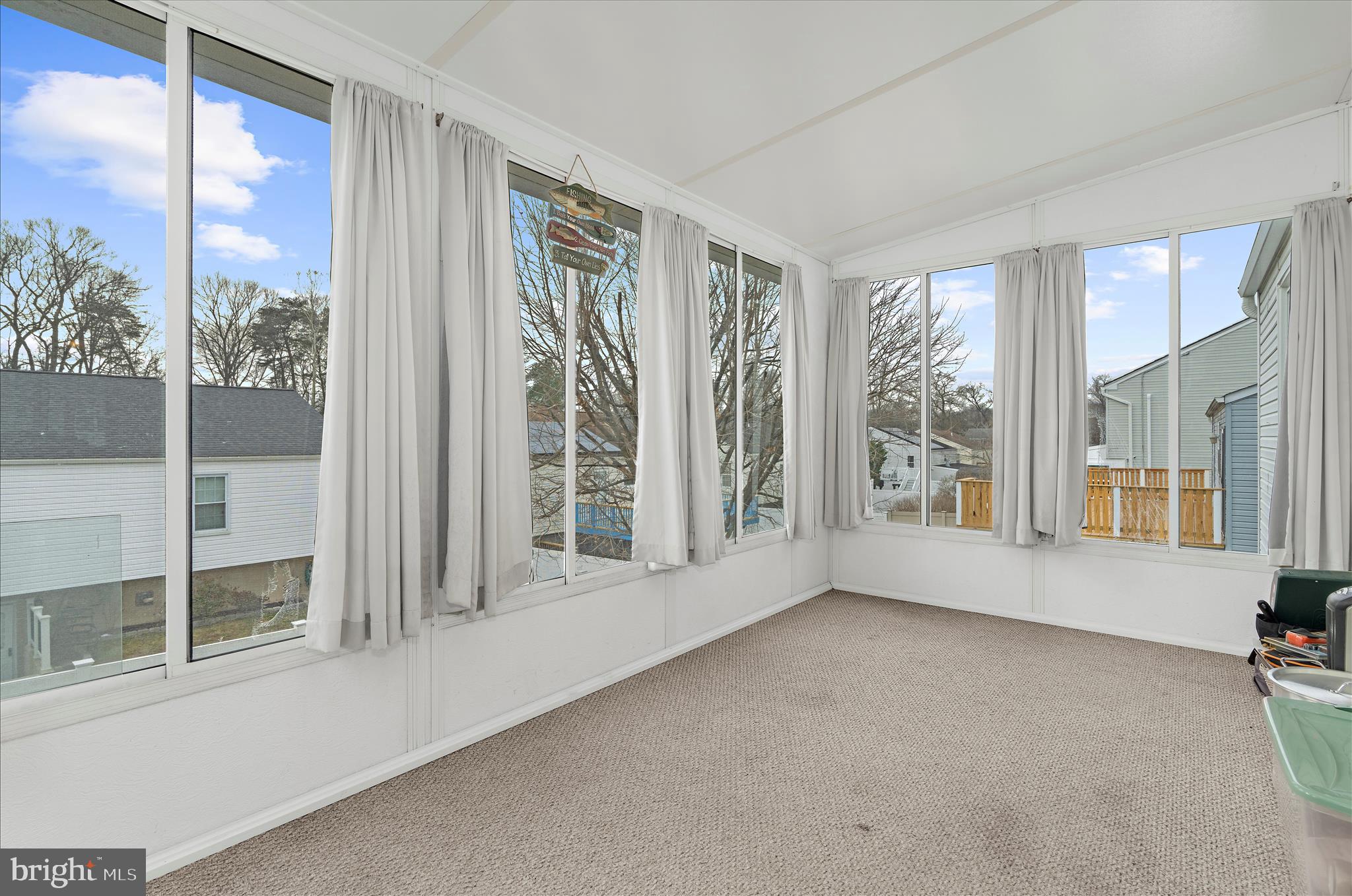 2313 230th Street Pasadena, MD 21122 - Photo 11 of 35 a view of an empty room with a window
