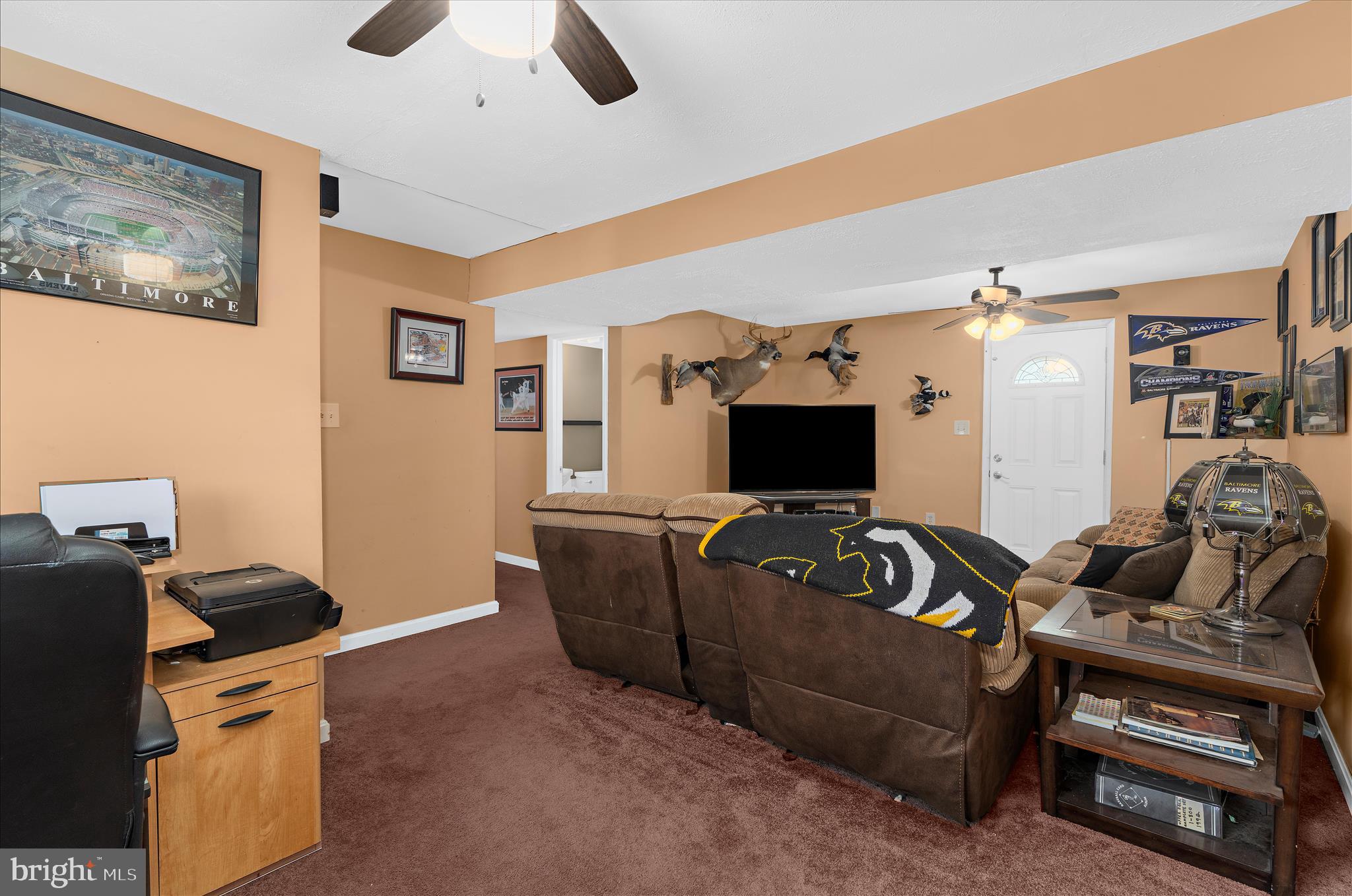 2313 230th Street Pasadena, MD 21122 - Photo 21 of 35 a living room with furniture and a flat screen tv