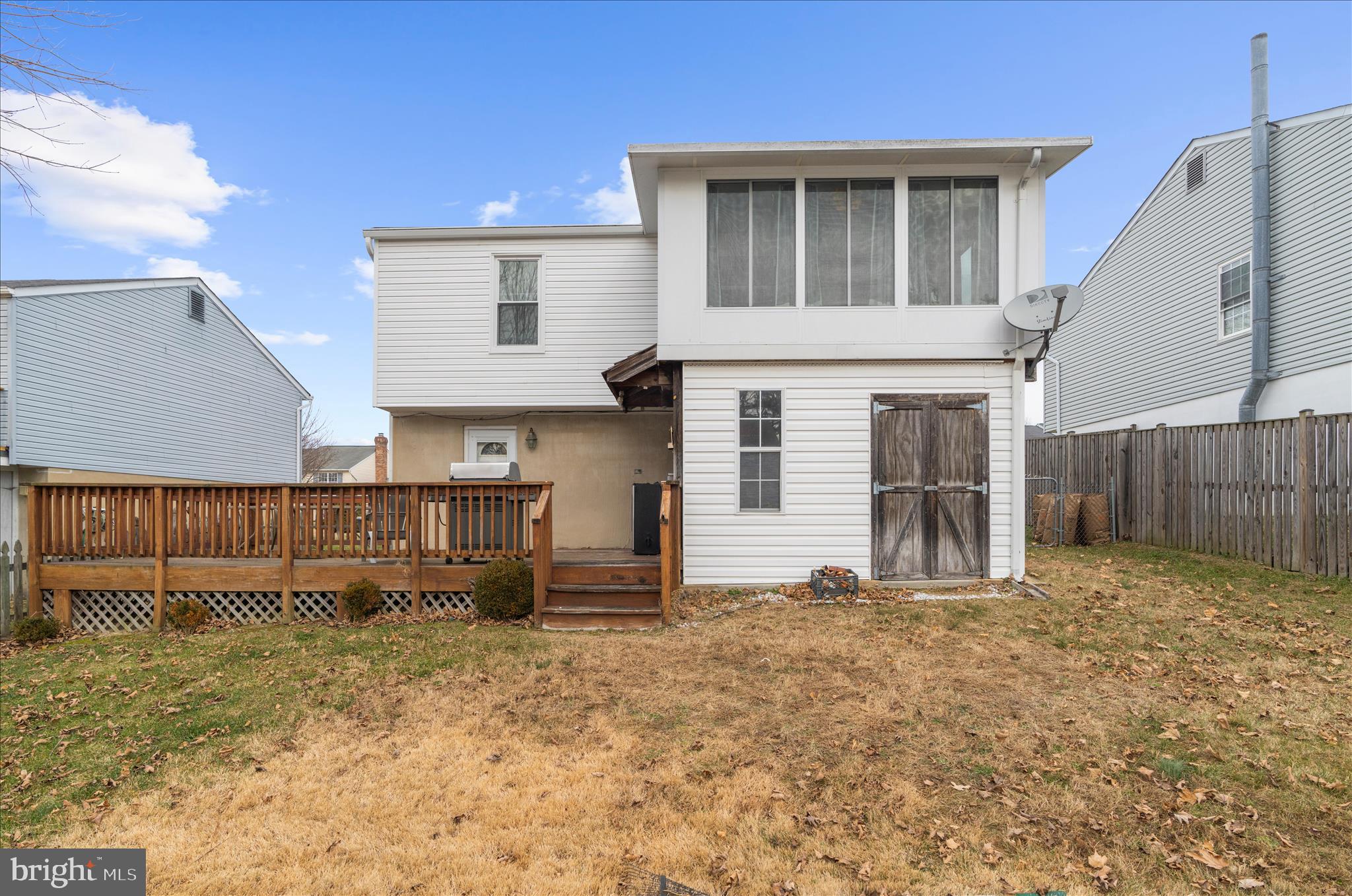 2313 230th Street Pasadena, MD 21122 - Photo 28 of 35 a view of a house with backyard and wooden fence
