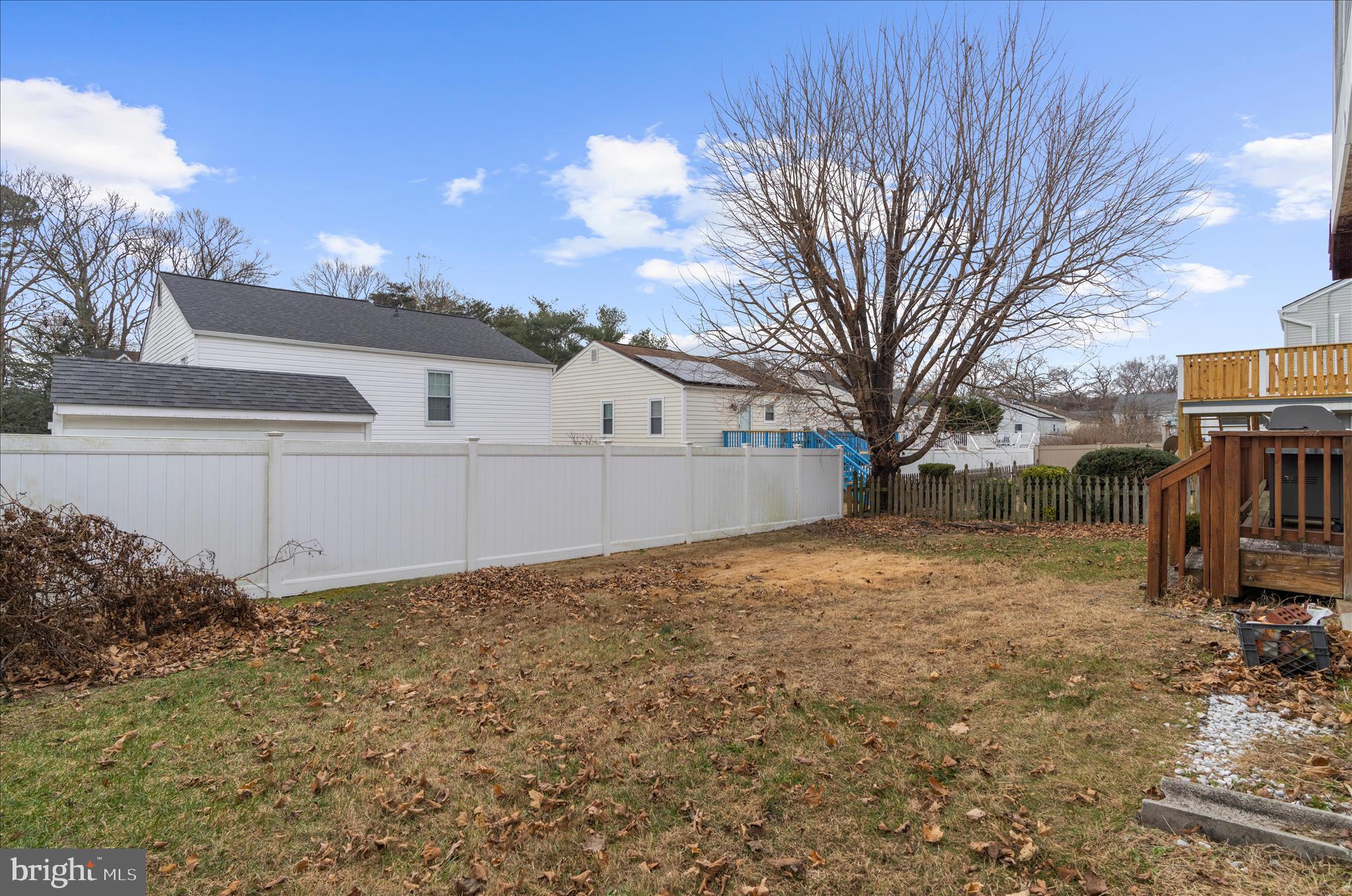 2313 230th Street Pasadena, MD 21122 - Photo 30 of 35 a view of a house with a yard