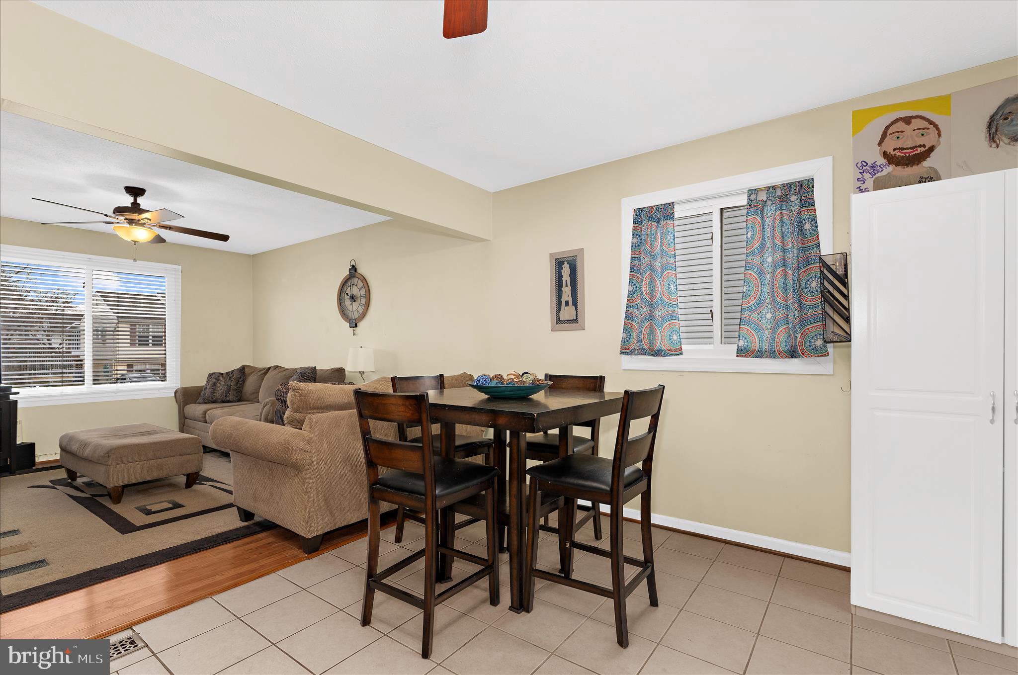 2313 230th Street Pasadena, MD 21122 - Photo 10 of 35 a living room with furniture and a large window