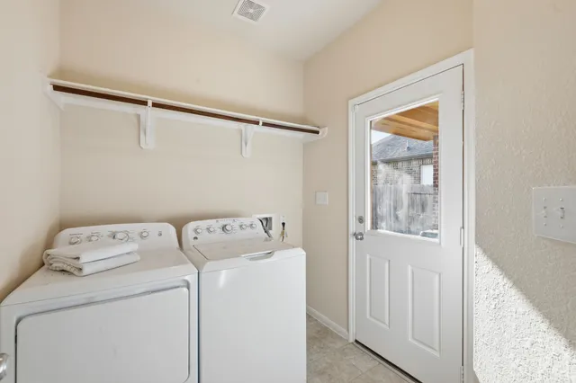 a view of a yard in front of a house