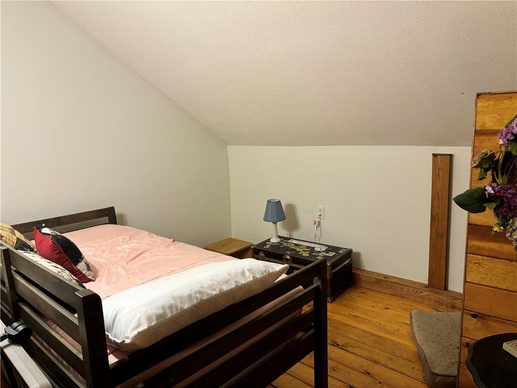 0 State Route 2006 Rural Valley, PA 16249 - Photo 15 of 28 a bedroom with a bed and a flat screen tv