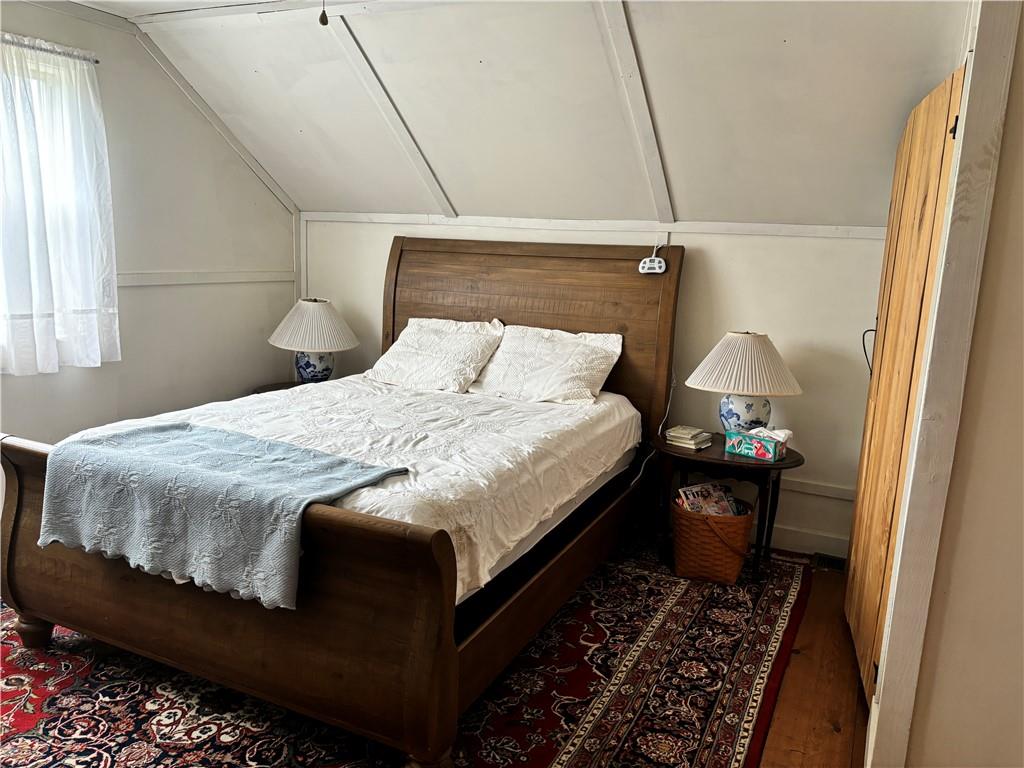 0 State Route 2006 Rural Valley, PA 16249 - Photo 20 of 28 a bedroom with a bed and wooden floor