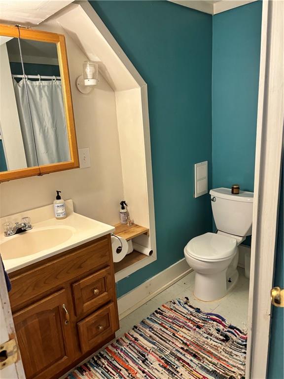 0 State Route 2006 Rural Valley, PA 16249 - Photo 21 of 28 a bathroom with a granite countertop toilet sink and mirror