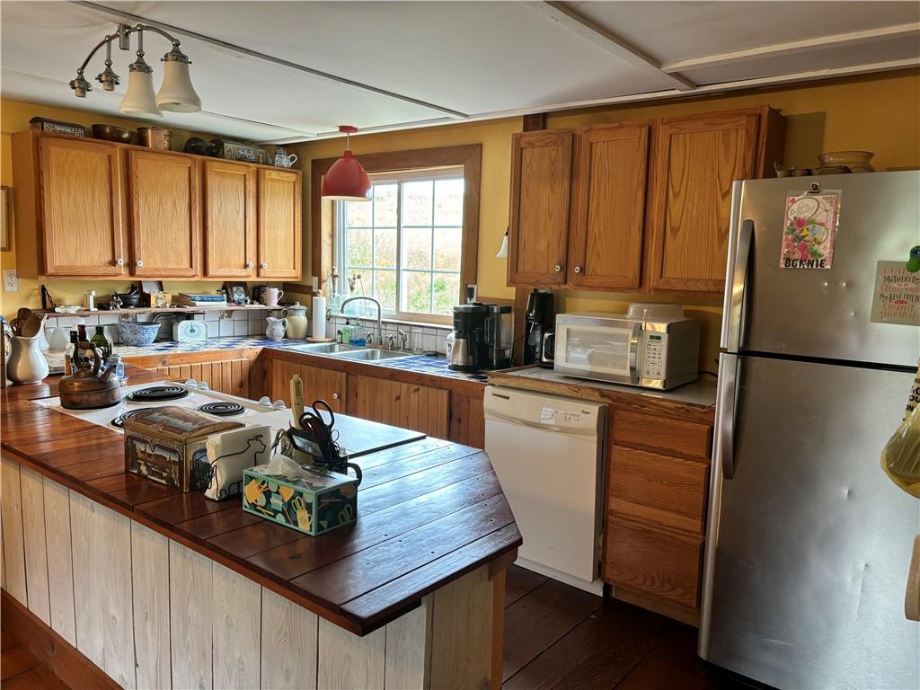 0 State Route 2006 Rural Valley, PA 16249 - Photo 3 of 28 a kitchen with stainless steel appliances granite countertop a sink stove and refrigerator