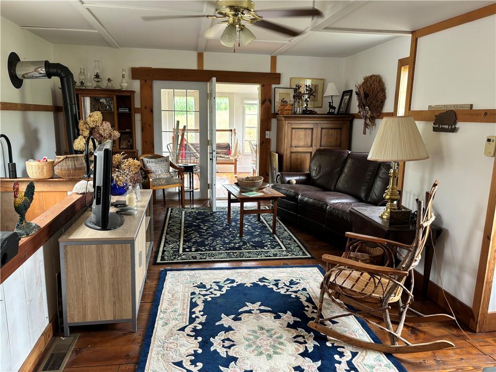 0 State Route 2006 Rural Valley, PA 16249 - Photo 8 of 28 a living room with furniture a rug and a chandelier