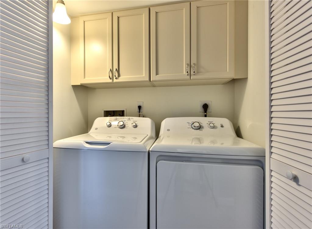 865 Teryl Road, Unit 2114 Naples, FL 34112 - Photo 18 of 26 a utility room with dryer and washer