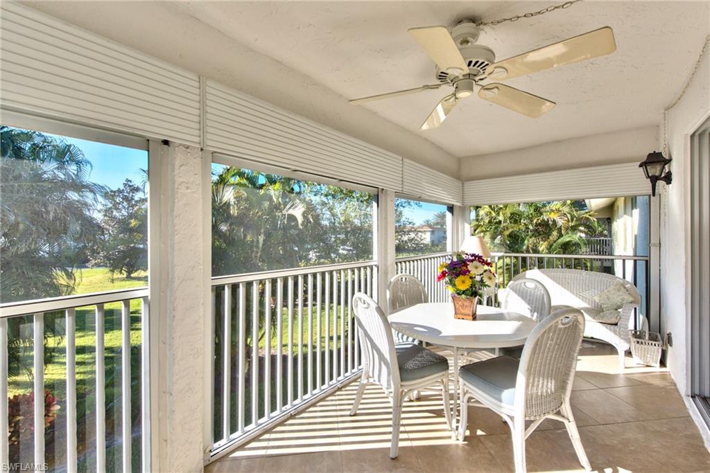 865 Teryl Road, Unit 2114 Naples, FL 34112 - Photo 2 of 26 a view of a dining room with furniture window and outside view