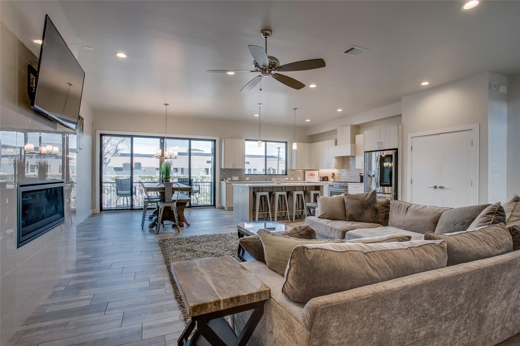 410 Melba Street, Unit 2 Dallas, TX 75208 - Photo 13 of 40 a living room with furniture and a flat screen tv