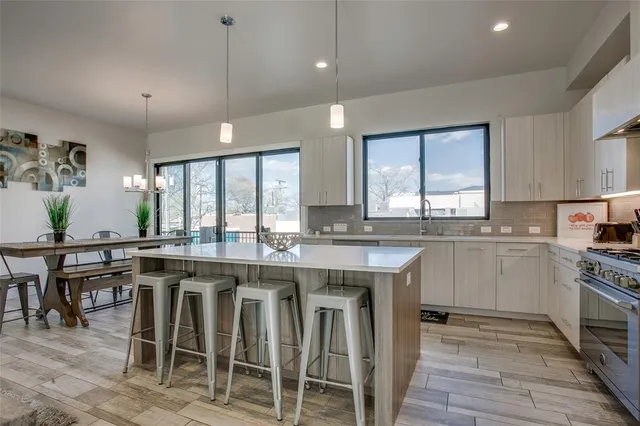 a kitchen with lots of counter top space and appliances