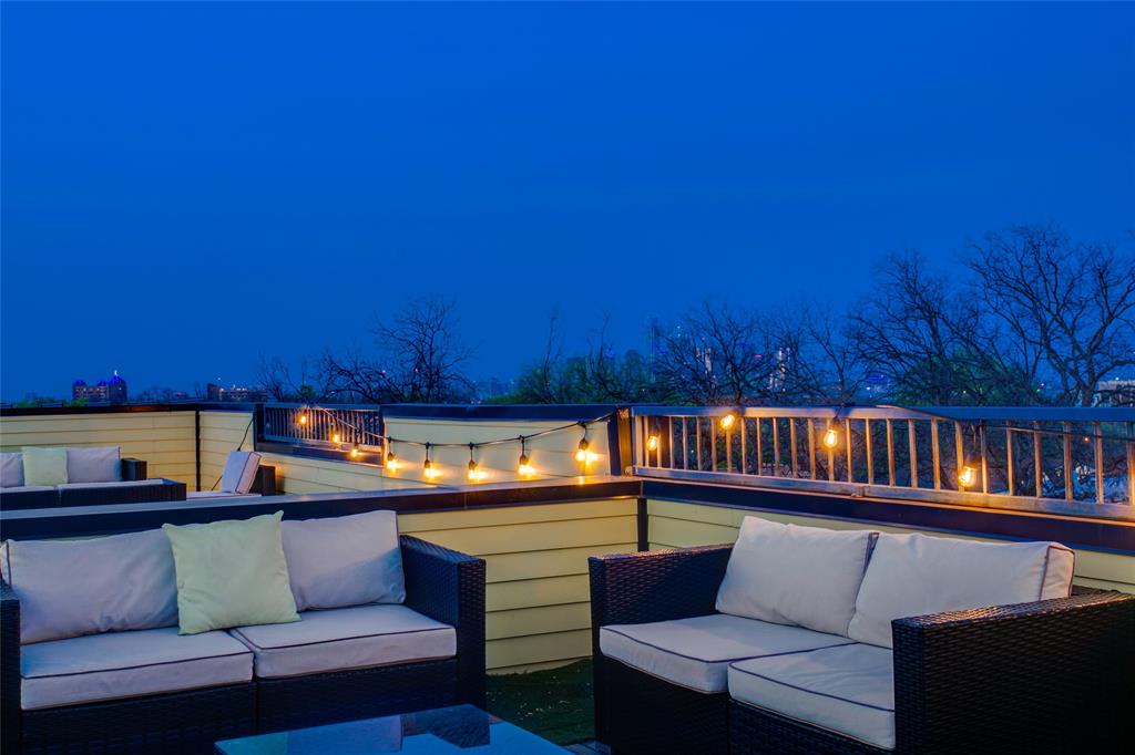 410 Melba Street, Unit 2 Dallas, TX 75208 - Photo 32 of 40 a reading room with furniture and a wooden floor
