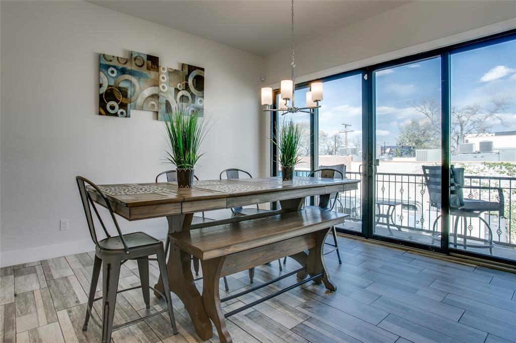 410 Melba Street, Unit 2 Dallas, TX 75208 - Photo 8 of 40 a dining room with furniture potted plants and wooden floor
