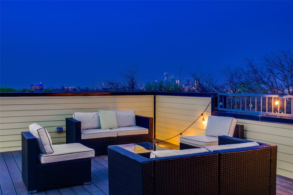 410 Melba Street, Unit 2 Dallas, TX 75208 - Photo 9 of 40 a view of a television with couches chairs