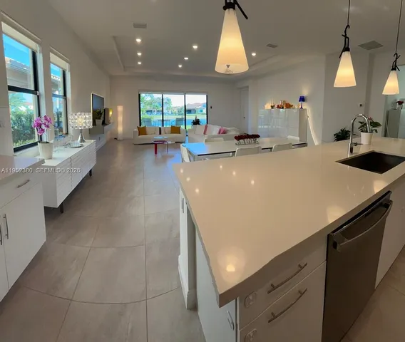 $1,030,000 | 12160 North Baypoint Circle, Parkland, FL 33076