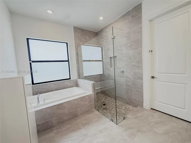 $1,030,000 | 12160 North Baypoint Circle, Parkland, FL 33076