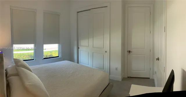 $1,030,000 | 12160 North Baypoint Circle, Parkland, FL 33076