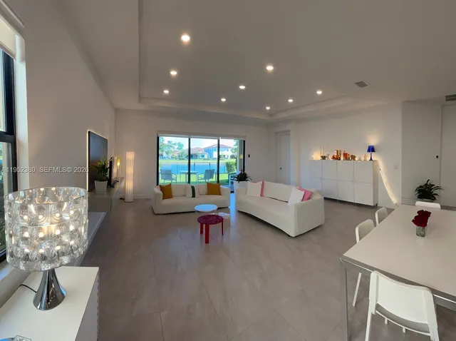 a living room with furniture and a table