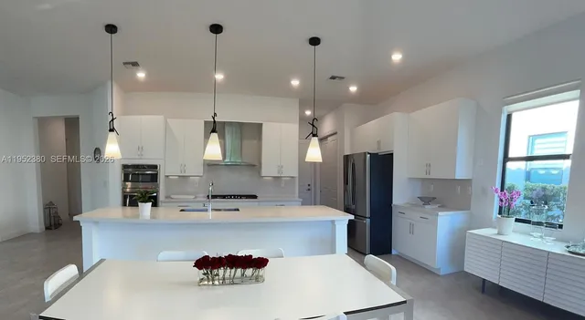 $1,030,000 | 12160 North Baypoint Circle, Parkland, FL 33076