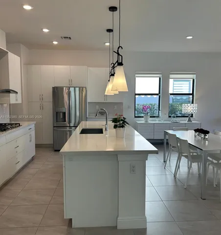 $1,030,000 | 12160 North Baypoint Circle, Parkland, FL 33076